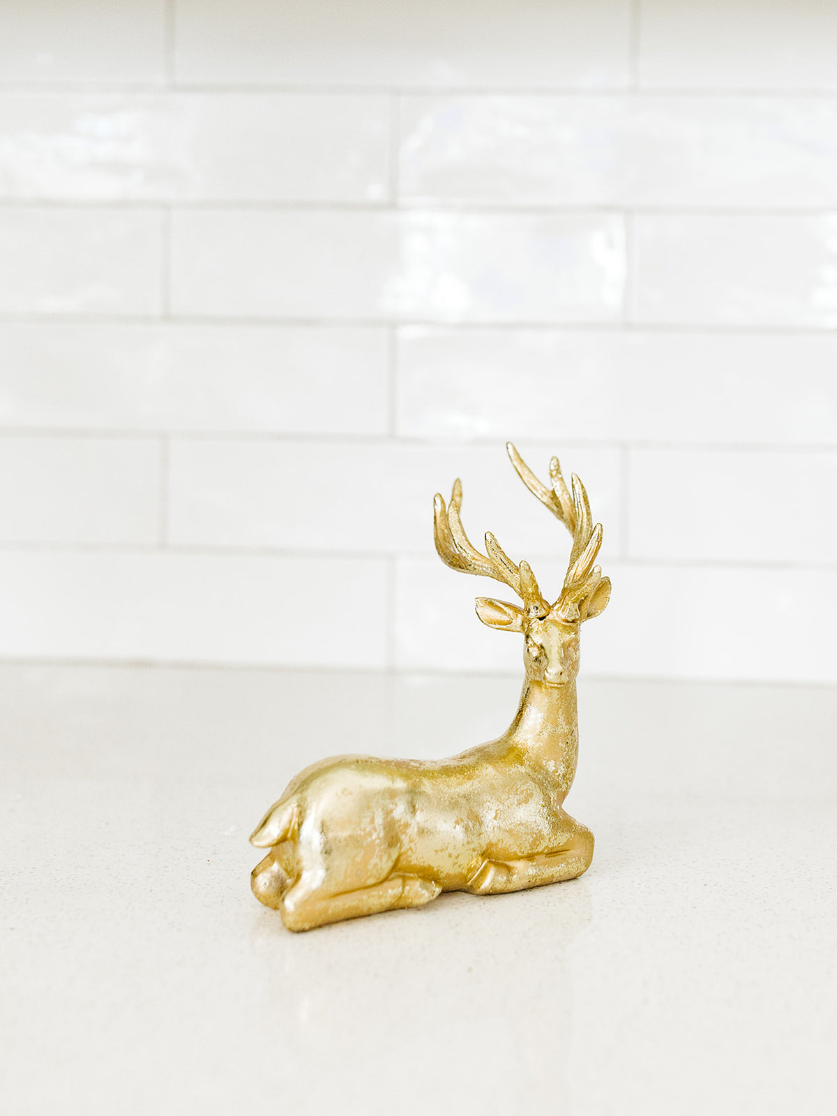 Gold Sitting Reindeer - 7.5"x6.5"