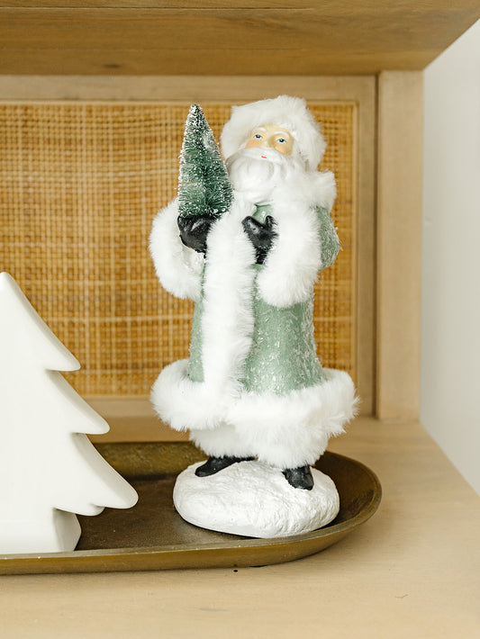 Green Santa Holding a Tree