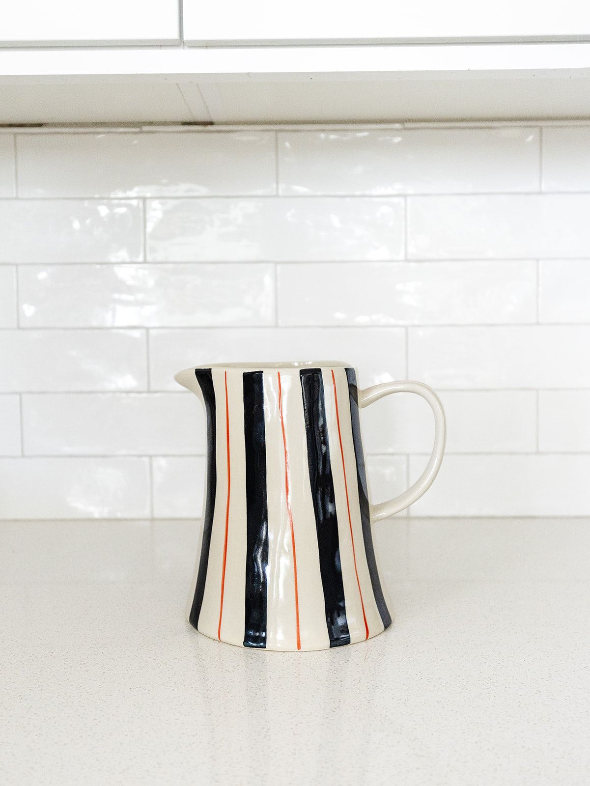 Red and Blue Striped Pitcher