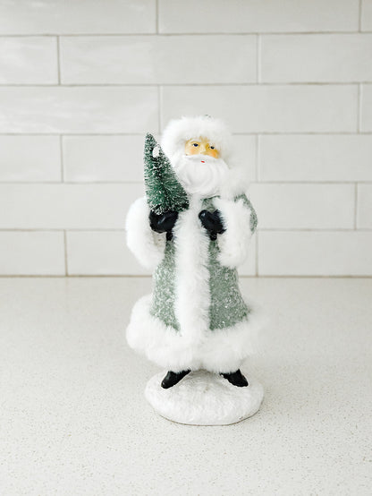 Green Santa Holding a Tree