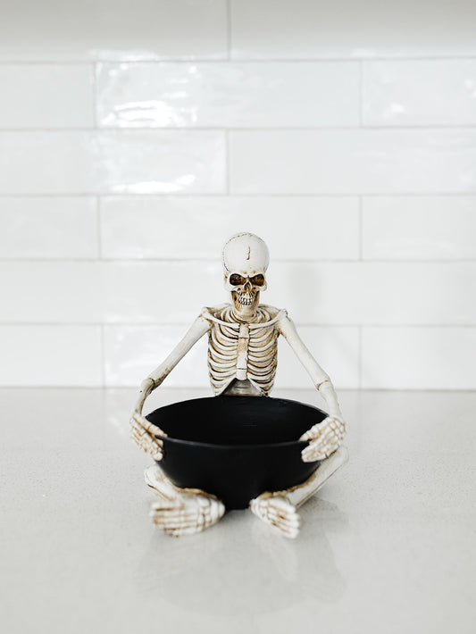 Sitting Skeleton Holding a Bowl -8"x6.75"x7.75"