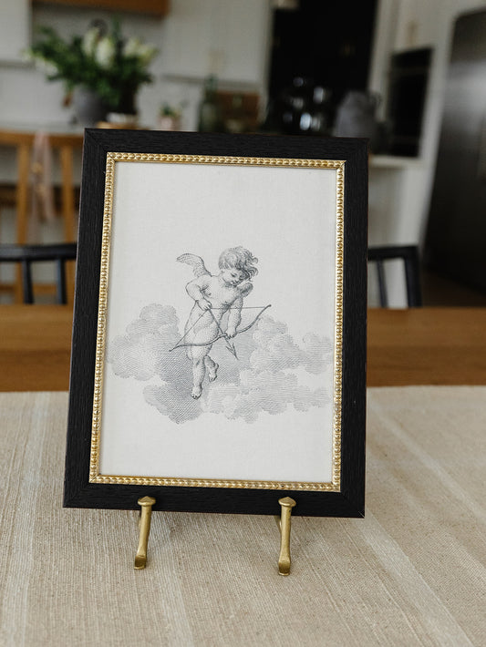 Cupid in the Clouds Framed Art